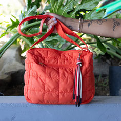 With an adjustable strap measuring from 27" at the shortest all the way to 53"
You can easily wear it as a short shoulder bag or a longer crossbody style!

Features include:
- Fun colorful removable keychain
- Two outside zipper pockets
- One main pocket with a small zippered pocket inside

This bag is LIGHT, hence the name, depending on what you carry is adjusts to your body making for the most comfy companion on all your adventures!

100% Nylon Exterior Trying Too Hard, Try Harder, All The Way, Inside Pocket