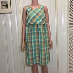 Northstyle Sleeveless Multicolored Plaid Fabric Midi Dress Size: 14 One Slip Pocket On Each Side Zips On The Back About 38” Long Armpit To Armpit (Bust): 20” Waist: 19" Arm Hole Width: 9" Bottom Hem Width: 23" Shell: 55% Linen 45% Cotton Lining: 100% Polyester No Stains, Tears Or Holes At All Excellent As Nwot Condition Clean And Smoke Free Home Quick Shipping- All Items Are Shipped Daily As Long As Usps Is Open. Make Me Offers! Message Me With Any Questions! You Like More Than One Item In My Cl Retro Sleeveless Beach Dress, Multicolor Retro Sleeveless Dress, Retro Multicolor Sleeveless Dress, Casual Cotton Sleeveless Lined Dress, Vintage Sleeveless Beach Sundress, Retro Multicolor Sleeveless Sundress, Multicolor Sleeveless Sundress For Daywear, Sleeveless Lined Orange Dress, Orange Sleeveless Lined Dress