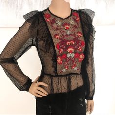 Sexy Black Mesh Top By Guess Has Polka Dots, Ruffles, & Colorful Embroidery. Long Sleeves & Gathered Waist. Buttons At The Back Of The Neck. Size Small. Underarm To Underarm It’s 17 Inches Across. Total Length Is 23 Inches. This Is Sheer & Would Look Good With A Black Sports Bra Tank Underneath. Flawless. But With Confidence; I’m A Posh Ambassador, Top-Rated Seller, & Fast Shipper. Chic Black Blouse For Festive Occasion, Chic Floral Embroidered Party Top, Black Summer Festive Blouse, Chic Party Tops With Floral Embroidery, Chic Floral Embroidery Party Top, Black Festive Blouse For Summer, Glamorous Black Sheer Blouse, Festive Black Blouse For Summer, Chic Black Tops With Floral Embroidery