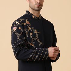 A deep blue indo-western set with embroidery of flowers on chest overlapping panel and sleeve with same fabric pants. Perfect for a groom for pre-events or for a formal party. Delivery Period: 20 Days Italian Embroidery, Zardozi Embroidery, Fabric Pants, Kurta Set For Men, Straight Fit Pants, Satin Color, Indo Western, New Launch, Band Collar