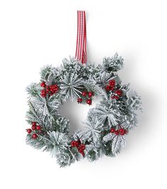 a christmas wreath hanging on a wall