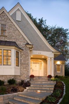 a house with steps leading up to the front door