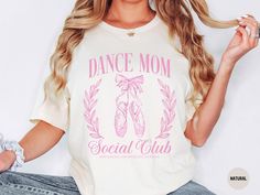 Discover our dance mom social club T-shirt. This unique design is the ideal trendy shirt for moms and makes the perfect dance mommy gift. Made to order, it ensures quality and exclusivity. Add it to your cart and enjoy your new Trendy tshirt for mom today! ABOUT THE T-SHIRT This classic jersey short sleeve tee fits like a well-loved favorite. Soft cotton and quality print make users fall in love with it over and over again. These t-shirts have-ribbed knit collars to bolster shaping. The shoulder