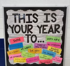 this is your year to bulletin board with post it notes on the front and back