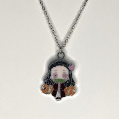 Brand New Handmade Manga Anime Demon Slayer Nezuko Kamado Necklace Stainless Steel And Enamel Pendant 1.25” X 1” Charm Pendant Stainless Steel Plated 18 Inch Chain Bundle & Save! Comes From A Smoke Free And Pet Free Home In California. Tags: Tanjiro Nezuko Kamado Giyu Tomioka Shinobu Kocho Zenitsu Agatsuma Muzan Kibutsuji Inosuke Hashibira Kanao Tsuyuri Kanao Kocho Anime Demon Slayer Nezuko, Slayer Nezuko, Demon Slayer Nezuko, Rose Gold Chain Necklace, Muzan Kibutsuji, Inosuke Hashibira, Kanao Tsuyuri, Boho Statement Necklace, Metal Choker