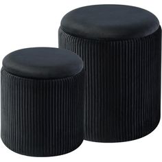 two black velvet stools with pleated fabric on the top and one has a round footstool