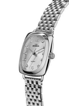 A vintage-inspired square case and polished bracelet lend contemporary sophistication to a diamond-marked watch that will perfect your poised ensemble. 28mm x 34mm case; 16mm band width Quartz movement Total diamond weight: 0.33ct. Color: G Clarity: VS1 Sapphire crystal face Stainless steel Made in the USA of imported materials >Diamond Guide Classic Diamond Watch With Metal Dial, Classic Diamond Watch With Rectangular Dial, Timeless Silver Square Watch, Elegant Silver Watch With Square Face, Silver Square Watch With Metal Dial, Classic Jewelry And Watches With Polished Rectangular Dial, Classic Square Watches With Diamond Hour Markers, Classic Watches With Rectangular Metal Dial, Classic Rectangular Metal Dial Watch