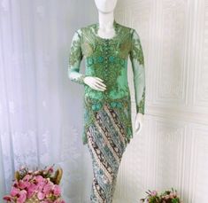 Sage green Kebaya tulle sequin glamour for you, this kebaya totally handmade, we sew the sequins one by one, and you will get  bustier for free. This kebaya look so gorgeous, with full sequins, you can wear it at your formal event: attending wedding ceremony, your engagement, graduation, and another formal event  we have some size for you: S, M, L, Xl, 2L We think that this kebaya should fit for you, so we need your body measurement to get the right size please send Us your measurement detail, b Kebaya Sage, Green Traditional Drape Sets For Ceremony, Kebaya Tulle, Green Traditional Drape Ceremony Sets, Outer Casual, Vera Kebaya, Nonya Kebaya, Kebaya Lace, Model Kebaya Tile Modern