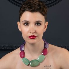 Features: * Elegant large statement necklaces for women in green, pink, and purple resin. You can pair these bold necklaces with a floral dress, a plain T-shirt, or even with formal office wear * 18 inch long wide necklace for women. 1.5 inches at its widest part with a screw clasp closure * These contemporary boho necklaces are made from coloured resin. These bohemian necklaces are handmade in Rajasthan * Add a dash of colour to your outfits with this chunky collar statement necklace in green, Unique Green Resin Necklaces, Multicolor Resin Jewelry For Party, Unique Green Resin Necklace, Bohemian Pink Resin Jewelry, Pink Bohemian Resin Jewelry, Green Resin Necklaces For Jewelry Making, Handmade Multicolor Resin Necklace, Bohemian Green Necklace, Purple Resin Jewelry For Party