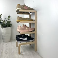 Tired of shoes spilling out all over your floor? This wood and metal shoe rack for entryway can help. Instantly create more space with its 4 tier of shoe storage, so you'll never trip over a rogue sneaker again! So take the hassle out of shoe storage, and say hello to effortless organization. DIMENSIONS: 4 tier shoe stand will work for 5 pairs of shoes Height: 24 inches (61 cm) Length: 11 inches (28 cm) Depth: 11 inches (28 cm) Distance between tiers: 6 inches (15 cm) PRODUCT MATERIAL: - Birch p Wall Mounted Shoe Organizer, Small Vertical Shoe Rack, Wall Shoe Storage, Vertical Shoe Rack, Wooden Shoe Rack, Shoe Stand, Shoes Organizer, Metal Shoe Rack, Wooden Shoe Racks