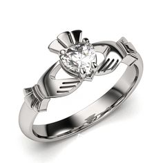 14K White Gold - Half Carat Lab Created Diamond Claddagh Ring SUE-LC-DIAM-WHITE 14K White Gold Half Carat Lab-Created DIAMOND Claddagh Ring. Excellent Quality. Available also in 14K Yellow gold. The ring is designed for petite hands so it is only available in sizes from 4 through 9 with half-size increments.Perfectly polished, excellent quality, nice looking Claddagh ring. Featuring: Certified 5X5 mm Lab-Created DiamondMeasurements: The ring pictured is in size 7 and weighs around 3.2 grams of 1 Diamond Claddagh Ring, Gold Claddagh Ring, Claddagh Ring, Claddagh Rings, Colorless Diamond, Heart Shaped Diamond, Ring Pictures, Gia Diamond, 2 Carat