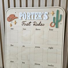 a wooden sign that says porter's first rodeo