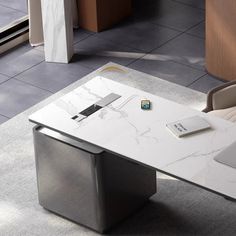 an office desk with a laptop on it