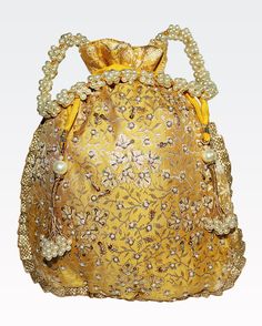 "Mustard Yellow Texture Hand Crafted Potli Bag With Beaded Chain For Women|| Evening Bags, Embroidery Handbag. Designed with the heart with zardozi , pearls work on this mustard yellow colour by using a premium quality of silk fabric. This beautiful Potli or evening party bag are eye catchy and made of premium material. Key Features: **Fabric: Silk **Size: 10\" x 8\" Colour: Mustard Yellow ** Easy to carry, The handle of the purse is beaded with pearl. **Easy to lock and unlock with matching drawstring. Tassels beaded with pearls **Beautiful embroidery detail work crafted with pearls, Zardozi, embroidery at the front side. **This potli purse is good match with your outfits and are superb for wedding and festive parties. **This would be best complement to your designer of any other kind of Festive Beaded Handheld Bags, Traditional Beaded Evening Bag For Festivals, Multicolor Embroidery Handwork Potli Bag, Traditional Handheld Potli Bag With Handwork, Festival Beaded Pouch Potli Bag, Beaded Festival Potli Pouch Bag, Beaded Gold Pouch Potli Bag, Festival Beaded Potli Bag As A Gift, Gold Beaded Pouch Potli Bag