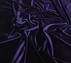 Are you looking for a fabric that is both stretchy and durable? If so, you may want to consider purchasing Purple stretch velvet. This fabric is made from polyester and spandex and can be used for a variety of purposes, including clothing, drapery, upholstery, and even crafts and costumes. **WHOLESALE PRICE** This is for 1 roll (bolt) of our Elegant and Beautiful 90% Polyester / 10% Spandex Purple Stretch Velvet Fabric Material which comes at 60 inches wide and has a total quantity of 50 yards. Jewel Colors, Moon Collection, Purple Fabric, Stretch Velvet, Velvet Material, Purple Velvet, Costume Dress, Cool Fabric, Wedding Guest Outfit