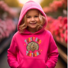 Introducing our adorable Turkey and Tantrums Toddler Hoodie, the perfect addition to your little one's wardrobe! Designed with comfort and style in mind, this long sleeve toddler hoodie is a must-have for any trendy tot. Featuring a charming turkey print on the front, this hoodie adds a touch of whimsy to your child's outfit. The vibrant colors and playful design are sure to capture attention and spark imagination. Whether it's for Thanksgiving festivities or everyday wear, this hoodie is a vers Thanksgiving Festivities, Turkey Print, Tantrums Toddler, Country Clothing, Toddler Hoodie, Christian Apparel, Country Outfits, Christian Clothing, Playful Design