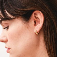 Elevate your ear stack with our Tapered Huggies. These not-too-big, not-too-small earrings boast a sleek and contemporary design, featuring a tapered silhouette that effortlessly hugs your earlobe. Crafted with precision from gold-filled material, these huggies offer a timeless blend of style and comfort, making them the perfect accessory for both the everyday as well as holidays and special occasions. Classic Everyday Pierced Huggie Earrings, Sleek Gold Earrings For Pierced Ears, Sleek Gold Earrings For Everyday Wear, Classic Gold Wrap Earrings, Sleek Gold Earrings, Classic Yellow Gold Earrings For Work, Modern Gold Plug Earrings For Everyday, Modern Everyday Huggie Earrings, Everyday Gold Huggie Wrap Earrings