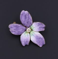 During Victorian and Edwardian times the gift of violets suggested that the giver's thoughts were occupied with love. A perfect love token, this 14k gold and purple enamel brooch/pendant features a glistening diamond accent at its center. The piece measures 1.4 inches from top to bottom by 1 inch wide, and it is in excellent condition. We have many other fantastic offerings of period fine jewelry posted on our Etsy store, so please consider browsing our other items. We send all items in individu Small Edwardian Purple Brooch, Yellow Gold Enamel Brooches For Gifts, Hallmarked Enamel Brooches As Gifts, Hallmarked Enamel Brooches For Gifts, Gift Enamel Brooches Hallmarked, Antique Purple Brooches As Gift, Lavender Brooch Jewelry As A Gift, Purple Brooch Jewelry Gift, Gold And Purple