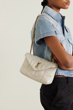 When investing in a bag, it's smart to abide by the 'buy now, wear forever' mantra. About as classic as it gets, SAINT LAURENT's 'Puffer Toy' is made from the softest leather and quilted to create spongy panels. The chain-trimmed shoulder strap matches the gold-tone 'Cassandre' plaque and the zip on the inside. White Shoulder Bag Outfit, Ysl Bag Outfit, Ysl Loulou Bag, Shoulder Bag Outfit, Bag Saint Laurent, Purse Outfit, White Puffer, Handbag Essentials, White Shoulder Bag