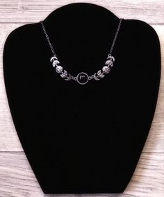 Bring some cosmic magic to your jewelry collection with this Crescent Moon Phase Goddess Choker! This stunning necklace celebrates femininity, intuition, and transformation with its intricate moon phase design. Wear it as a reminder to embrace your inner goddess and radiate positive energy wherever you go. (P.S. It makes a great gift for any moon-loving gal pal!) Chain: 19.7 inches Radiate Positive Energy, Gothic Necklaces, Cosmic Magic, Triple Moon Goddess, Gothic Necklace, Triple Moon, Gal Pal, Black Choker, Moon Goddess