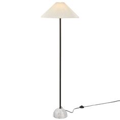 a floor lamp with a white shade on the base and a black cord attached to it