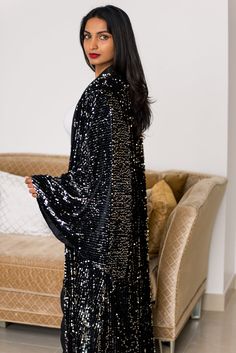 Luxuriate in this velvet sequins wrap dress with wide sleeves. Savor the elegance of this hand-finished kimono robe that looks like a piece of art. Buy now! Chic Wrap Kimono For Parties, Elegant Festive Kimono For Party, Elegant Long Sleeve Kimono For Parties, Elegant Evening Kimono For Festive Occasions, Luxury Long Sleeve Evening Kimono, Elegant Long Sleeve Kimono For Night Out, Dress With Wide Sleeves, Sequin Wrap Dress, Sequin Kimono