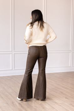 These bellbottoms are not just pants; they are a statement piece. Pair them with a flowy blouse, a tucked-in tee, or a tailored blazer – the styling possibilities are endless.Model & Fit Model: Maggie ( 5'5 and Size 6 or S) Fitted through waist and hips Stretch: No Zipper Fly Light distressing throughout for a more worn look Flare Leg High rise: 11.5" Inseam: 32" Fabric & Care Material: 100% PU Leather Care Instructions: Wash Cold, Dry Flat Manufactured overseas