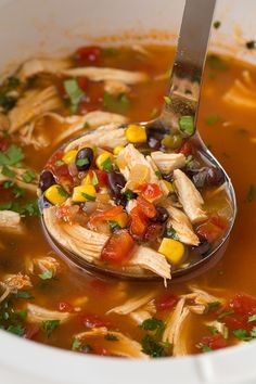 a spoon full of chicken tortilla soup