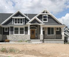 a house under construction on a cloudy day