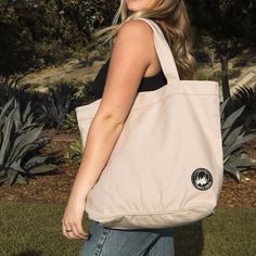 Made with 14 oz organic cotton canvas GOTS certified, low impact dyes 29L capacity, 15" H x 20" W x 6" G Inside pocket, 7"H x 7"W Made in a Fair Trade Certified Factory Handcrafted in Kolkata, India From grocery shopping to a day at the beach, the large Lupa Canvas Tote is the go-to when you need extra hauling capacity. The Lupa is made with super durable 14-oz organic cotton canvas. It features a spacious 29L carrying capacity, sturdy handles that are easy to sling over a shoulder, and a small Cotton Canvas Bag With Silt Pocket For Everyday, Practical Cotton Bags With Pockets, Casual Canvas Bag With Cotton Gusset For Daily Use, Practical White Cotton Canvas Bag, Practical Everyday Cotton Canvas Bag, Casual Cotton Canvas Bag For Everyday Use, Natural Cotton Bags For Everyday Use, Eco-friendly Cotton Bag With Pockets, Eco-friendly Cotton Bags With Pockets