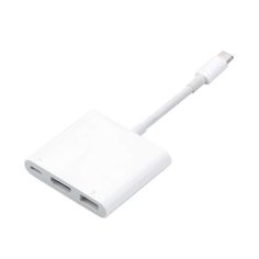 an apple charger is plugged into the macbook pro with a usb cable