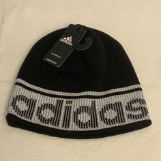 New Adidas Hat. Color Black/White. White Beanie Hats For Streetwear, Black Sporty Beanie Hat, Sporty Black Beanie Hat, White Outdoor Beanie Cap, Black Beanie For Sports, Adjustable White Adidas Hat, Adidas Casual Black Hat, Adidas Bucket Hat, Pink Basketball