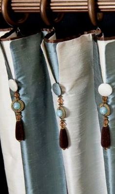 curtains with tassels and beads hanging from them