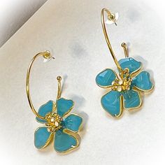 Beautiful Blue Hoop Hibiscus Enamel Fashion Earrings Gold Tonehoop Measures 1.5”Flower Measures 1.5”Very Cute Trendy Blue Flower Earrings, Trendy Blue Flower Shaped Jewelry, Trendy Nickel-free Blue Hoop Earrings, Blue Flower Charm Earrings, Blue Flower Hoop Earrings Gift, Blue Flower Shaped Hoop Earrings, Blue Flower-shaped Hoop Earrings, Blue Flower Hoop Earrings As Gift, Square Diamond Studs