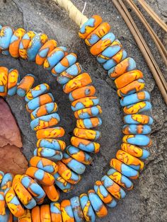 A beautiful strand of 130 African Glass Krobo Disk beads on raffia 25 inches long. Each handmade bead measures approximately 3mm x 10mm. The hole is 3mm. Prescott Az, Handmade African, African Queen, African Beads, Gold Line, Handmade Beads, Glass Beads, Beaded Necklace, Etsy Gift Card