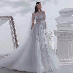 Silvery Oasis: Dubai-Inspired Crystal-Embellished Evening Gown with Elegant Cape - The Premier Choice for Arabic Proms, Weddings, and Grand Celebrations. Formal Dresses For Women Wedding, Evening Dress With Cape, Dubai Evening, Elegant Cape, Prom Formal Dresses, Silver Prom Dress, Silver Evening Dress, Grey Evening Dresses, Arabic Dress