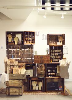 a room filled with lots of wooden crates