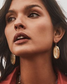 Our iconic silhouette gets a handcrafted touch in the Elle Vintage Gold Etch Frame Drop Earrings in Iridescent Abalone. Featuring an etched metal frame inspired by tooled leather saddles, these earrings are the bit of vintage-inspired charm your earring collection needs. These earrings are a part of Yellow Rose by Kendra Scott—a brand that celebrates ranch life with Kendra Scott staples alongside select curated jewelry pieces and accessories. Metal Vintage 23k Yellow Gold Over Brass Material Iridescent Abalone Closure Earwire Size 1.75"L X 0.78"WDue to the one-of-a-kind nature of the medium, exact colors and patterns may vary slightly from the image shown. | Kendra Scott Elle Vintage Gold Etch Frame Drop Earrings in Iridescent Abalone | Abalone/Metal High Luster Gold Earrings, Gold High Luster Earrings, Vintage Gold Cuff Bracelet, Abalone Jewelry, Short Pendant Necklace, Metal Etching, Earring Collection, Gold Cocktail Ring, Ranch Life