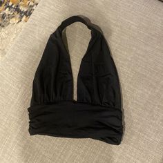 Never Worn Elegant Black Halter Top For Beach, Black Halter Top For Summer Evenings, Black Chic Halter Top For Night Out, Chic Black Halter Top For Night Out, Casual Black Halter Top For Party, Chic Black Halter Top For Spring, Black Halter Top For Spring Evening, Spring Black Halter Top, Black Halter Top For Beach In Spring