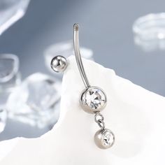 The titanium material is lightweight and has no damage to the skin, very good for sensitive skin. This dangle belly button ring is a very classic style and there are four lengths available, 10mm,12mm,14mm, and 16mm. You can find the most comfortable length for your navel piercing. Double Belly Button Piercing, Belly Button Piercing Rings, Titanium Belly Button Rings, Ring Day, Conch Hoop, Dangle Belly Rings, Dragon Claw, Skull Hand, Piercing Ring