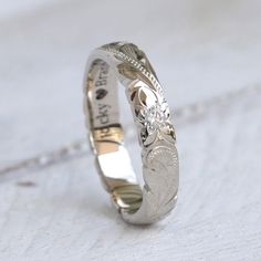 "This beautiful Stackable Gold Rings With Diamond is perfect for someone who love simplistic design with classy look and feel. 100% handmade. Engraved with Hawaii's Plumeria flower and Maile leaf. Handmade with 14K gold. Ring width is 4mm. Lovin' Hawaii Jewelry Features ✔ Made to Order. Handmade in Hawaii. ✔ Hand engraved design. ✔ Gold Kt: 14 Karat ✔ Diamond : 2mm ✔ Available Gold Color: Rose Gold, Yellow Gold, White Gold ✔ Ready to Ship in 5 Business Days ✔ Free inside message engraving (To pe Elegant White Gold Rings With Engraving Option, Wedding Stackable Rings With Engraving Option, Elegant Couple Rings With Engraving Option For Wedding, Elegant Wedding Couple Rings With Engraving Option, White Gold Sterling Silver Wedding Ring With Engraving Option, Minimalist White Gold Engraved Wedding Ring, Minimalist Engraved White Gold Wedding Ring, Elegant Stackable Rings With Engraving Option, Heirloom Style Polished Wedding Stackable Rings