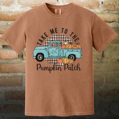 "Take Me to the Pumpkin Patch" T-Shirt - Fall Adventure Awaits! 🚜 Get Ready for Autumn Fun with a Pumpkin-Filled Tee! 🎃 Hit the road to your favorite fall destination with our "Take Me to the Pumpkin Patch" t-shirt! Featuring a charming graphic of a truck brimming with pumpkins, this tee is perfect for celebrating the harvest season and showing off your love for autumn adventures. Why You'll Love It: 🍁 Charming Graphic - The delightful design of a vintage truck loaded with pumpkins captures the essence of a classic pumpkin patch visit, adding a touch of nostalgia and whimsy to your fall wardrobe. 🚜 Comfortable Fabric - Crafted from 100% ring-spun cotton, this shirt offers a soft, breathable fit that's ideal for cool fall days and casual outings. 🍂 Versatile Colors - Available in a ran Cute Fall T-shirt With Screen Print, Brown Graphic Print T-shirt For Fall, Vintage Soft-washed T-shirt For Fall, Thanksgiving Cotton Graphic Print T-shirt, Thanksgiving Cotton T-shirt With Graphic Print, Thanksgiving Graphic Print Cotton T-shirt, Patch Tshirt, Autumn Adventures, Pumpkin Tshirt