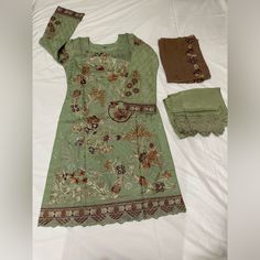 Pakistani Attire, Desi, South Asian, Handmade/Embroidered. Color: Moss Green Size: M, 40-42 (Medium), L, 42-44 (Large) Materials* Dress/Top: Inner Is Cotton, Outer Is Chiffon, Embroidery Pants/Trousers: Silk, Embroidery Dupatta/Scarf: Chiffon, Embroidery Georgette Dress With Multicolor Embroidery And Dabka Work, Fitted Multicolor Embroidered Sets, Anarkali Fitted Set With Multicolor Embroidery, Semi-stitched Multicolor Embroidery Dress With Long Sleeves, Semi-stitched Long Sleeve Dress With Multicolor Embroidery, Elegant Designer Dresses With Multicolor Embroidery, Spring Floral Embroidery Semi-stitched Dress, Embroidered Long Sleeve Sets In Georgette, Embroidered Georgette Sets With Long Sleeves