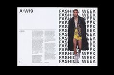 a man is standing in front of a fashion week poster with his name on it