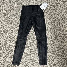 Bnwt Black Faux-Leather Look Delancey Gleam Moto Tight In Size Xs. Never Worn. Moto Details On Thighs Add Flattering Texture (See Irl Photos). Black Stretch Leather Pants For Streetwear, Fitted Moto Leather Pants, Fitted Moto Leather Pants For Fall, Fitted Moto Pants For Winter, Fitted Black Moto Leather Pants, Moto Style Fitted Winter Pants, Fitted Black Moto Pants, Athleta Pants, Black Faux Leather