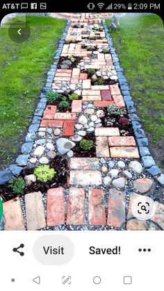 an image of a long brick path made out of rocks and stones with the words visit saved on it