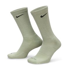 Elevate your workout experience with the Nike Everyday Plus Cushioned Crew Socks. Crafted with precision by Nike, these socks are designed to enhance your comfort and performance. Engineered with advanced sweat-wicking technology and excellent breathability, it ensures your feet stay dry and cool even during the most intense workouts. With the Nike Everyday Plus Cushioned Socks, you'll have the extra edge you need to power through that extra set. Upgrade your athletic gear with these exceptional Breathable Comfortable Socks For Gym, Breathable Comfortable Gym Socks, Breathable Casual Socks For Gym, Breathable Casual Gym Socks, Comfortable Green Anti-odor Socks, Comfortable Anti-odor Green Socks, Breathable Green Sports Socks, Breathable Sports Socks In Green, Comfortable Running Socks Sweat Resistant