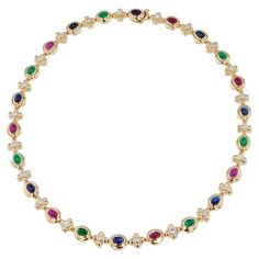 Admire the exquisite brilliance of the Multi-Color Yellow Gold Estate Necklace, featuring 8 Sapphires, 7 Rubies, 7 Emerald Cabochons, and 22 Diamonds totaling approximately 1.75 carat total weight. G/H in color and SI1/SI2 in clarity. Crafted from 14 karat yellow gold in the 1980's, this truly unique piece is sure to add a luxurious touch to any ensemble. This beautiful piece measures 16 inches in length. -Multi-Color Yellow Gold Estate Necklace -8 Sapphires, 7 Rubies & 7 Emerald Cabochons -22 Diamonds approx. 1.75ct TW G/H SI1/SI2 -14KT Yellow Gold -Circa 1980's Luxury Exquisite Cabochon Necklace, Necklace Emerald, G H, Yellow Color, Unique Pieces, Choker Necklace, Emerald, Ruby, Sapphire