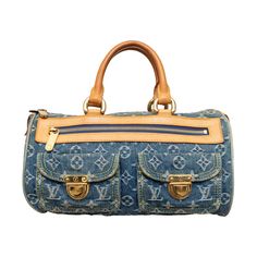 Expertly crafted with durable blue monogram denim canvas and luxurious beige leather, the Louis Vuitton Neo Speedy Monogram Denim Handbag effortlessly combines style and functionality. With a spacious interior, secure zip closure, and multiple pockets for organization, this handbag is the perfect accessory. Inclusion: Dust bag. Remarks: There are some spots on the leather. Height:16;Width:30.5;Depth:15;Handle Drop:10.5 Material: Fabric Leather Louis Vuitton Handbags 1stdibs, Denim Handbag, Louie Vuitton, Louis Vuitton Store, Embroidered Handbag, Denim Handbags, Envelope Bag, Lv Monogram, Vintage Louis Vuitton