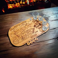 a wooden board with glasses on it sitting on a table next to a fire place